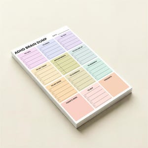 Pastel rainbow ADHD brain dump notepad with compact 4x6in sticky sheets, divided sections for tasks, ideas, reminders, and notes, designed for focus, organization, and visual clarity.