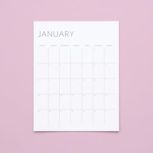 May include: A white paper calendar page for the month of January with black sans-serif text. The grid layout includes headers for Monday through Sunday and numbered dates from 1 to 31, organised into five horizontal rows of rectangular cells.