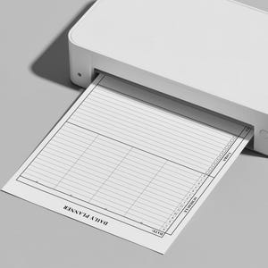 Close-up of daily planner layout with clean typography and simple sections for priorities and notes.