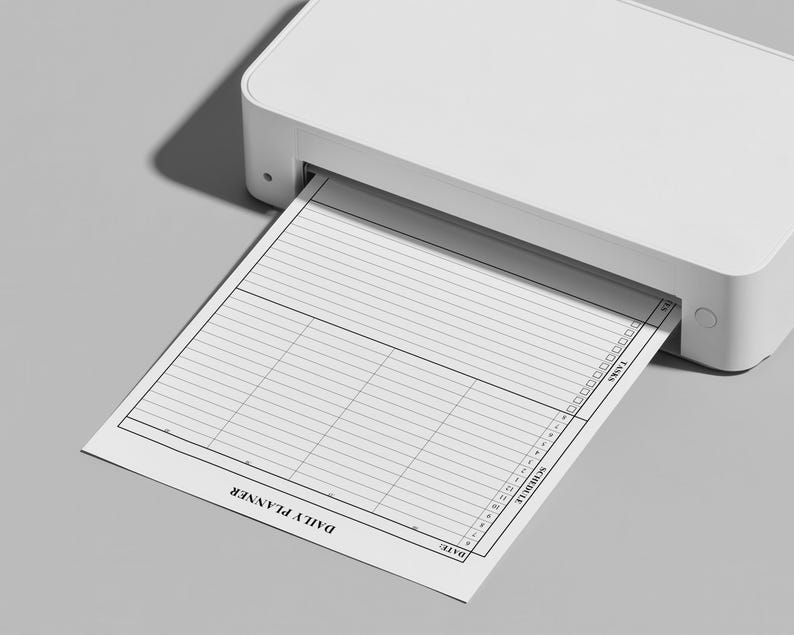 Close-up of daily planner layout with clean typography and simple sections for priorities and notes.