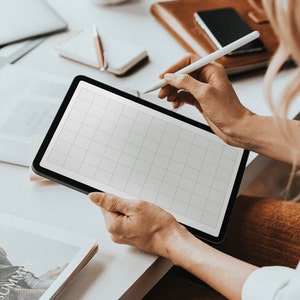 Digital screenshot of 10x10 graph-paper PDF template displayed on a tablet screen, showing fine grey grid lines and crisp alignment for digital planning or note-taking.