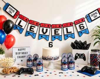 May include: A festive birthday party scene with a banner that reads "LEVEL 6" and "GAME ON" on the ends. There are balloons, a cake, snacks, and game controllers. A sign says "HAPPY BIRTHDAY CHAMP!"