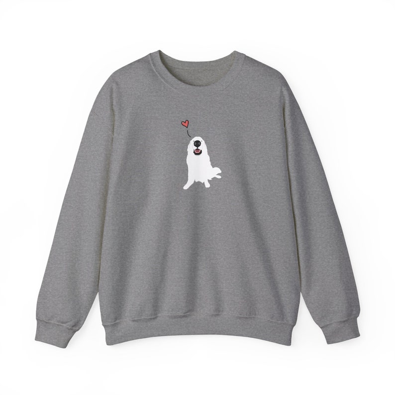 May include: A grey sweatshirt featuring a white dog illustration wearing a red heart on its head. The dog is looking up and smiling.