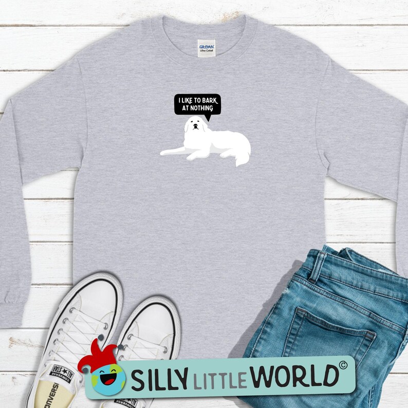 May include: A gray long-sleeved t-shirt with a white dog illustration and the text "I like to bark at nothing".