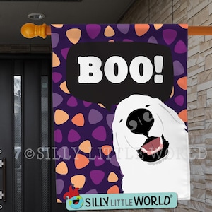 May include: A rectangular garden flag featuring a white dog with a black nose and open mouth. The background is a purple pattern of orange and purple triangles. A black speech bubble contains the white text BOO! The text SILLY LITTLE WORLD is visible.