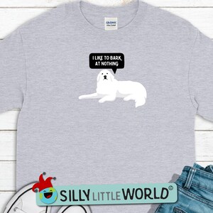 May include: A gray t-shirt with a white dog illustration and a speech bubble that says "I like to bark at nothing".