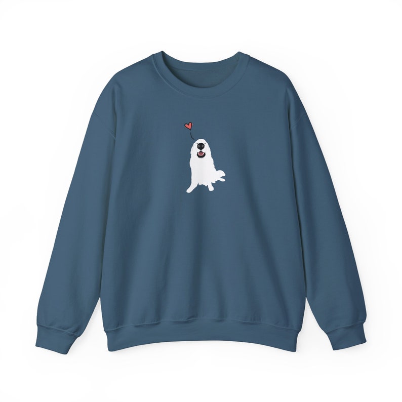 May include: A dark blue sweatshirt featuring a white illustration of a dog looking up at a red heart.