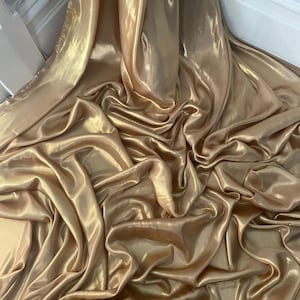 1 meter beige/gold shiny soft shimmer satin fabric 58” wide