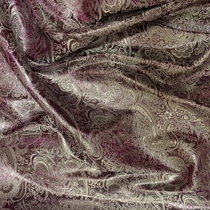 1 meter maroon/silver shiny paisley design metallic brocade fabric..58” wide