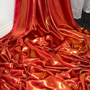 1 meter red/gold soft shimmer on satin fabric 58” wide
