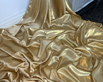 1 meter gold/gold soft shimmer on satin fabric 58” wide