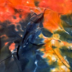 1 meter orange/dark grey tie dye 100% cotton batik fabric 45” wide