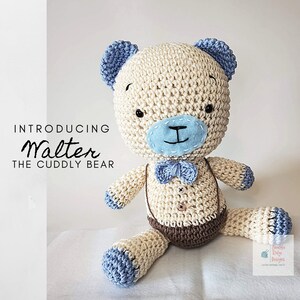 May include: A crocheted teddy bear named Walter, wearing a blue bow tie and brown overalls. The bear is cream colored with blue accents on the ears and feet. The text "Introducing Walter The Cuddly Bear" is visible in the image.
