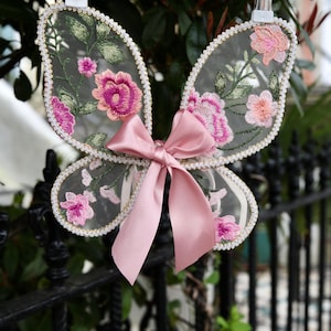 Pink Fairy wings for babies. Tulle fabric with handcrafted embroidered pink flower design. Cake smash, birthday photo shoot.