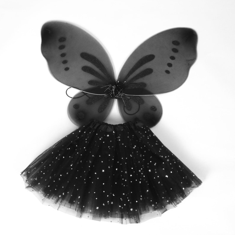 Halloween dark fairy costume for kids, with optional tutu and mask, black fairy wings. The black tulle tutu is covered with sparkling silver stars and moons.