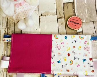 muslin taggie blanket
