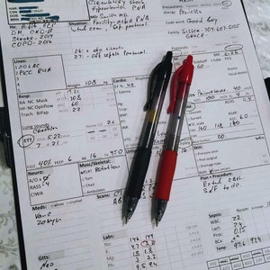 May include: A close-up of a medical chart with handwritten notes and vital signs. The chart includes information about a patient's medical history, current condition, and treatment plan. The chart also includes a list of medications and lab results. The chart is dated 5/27.