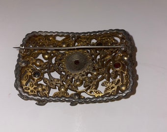 1920s mauvasite glass flower brooch