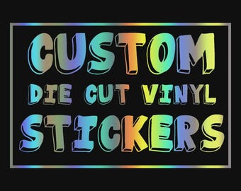 May include: A rectangular graphic on a black background featuring the text CUSTOM DIE CUT VINYL STICKERS in a bold, rounded font. The letters display a vibrant, iridescent holographic gradient shifting through shades of blue, green, and orange.