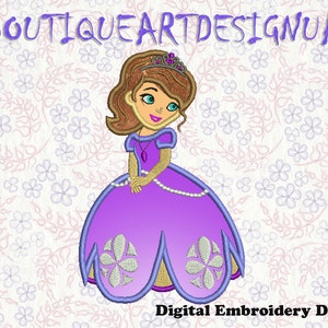 May include: Embroidered design of a cartoon princess wearing a purple dress with a pearl necklace and a crown. The design is on a white background with a floral pattern.