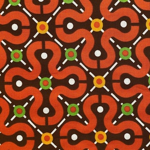 Orange white and green print, curves and squares against brown background, quilt shop quality, sold as yardage, in stock and ready to ship!