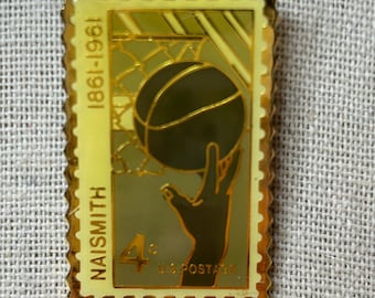 Francobollo USPS d'epoca da 4 centesimi raffigurante una spilla da basket