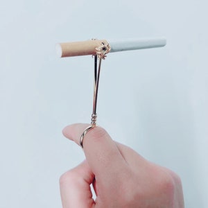 Smoking Accessories Metal Ring Holder Practical Portable Cigarette Holder  Finger Holder Cigarette Holder Clip Skull From Cleanfoot_elitestore, $2.06