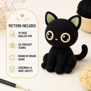 May include: A black crocheted cat toy with large eyes and light green inner ears. Beside it, a text panel reads: PATTERN INCLUDES, 10-PAGE ENGLISH PDF, US CROCHET TERMS, ROUND-BY-ROUND GUIDE, ASSEMBLY & WIRE SAFETY. A 2.25 mm crochet hook is visible.