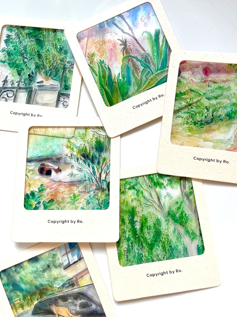 May include: Six watercolor paintings of nature scenes framed in white cardstock with the text "Copyright by Ro." at the bottom of each frame.