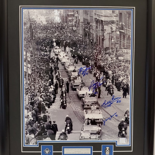 Toronto Maple Leafs "Bay Street Parade" 23' x 27' Framed Print Autographed By Bobby Baun , Johnny Bower, Larry Hillman and Larry Jeffrey