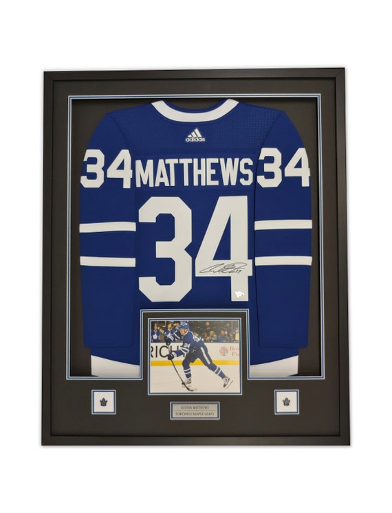 framed autographed jersey