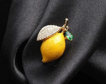 Vintage brooch, lemon, gold-plated, enamelled, with rhinestone