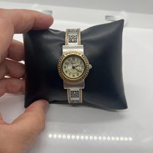 Geneva Silvertone cuff watch