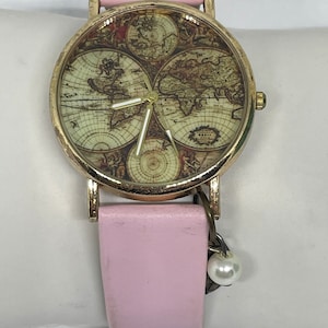 Vintage globe ladies watch