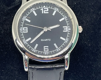 Vintage black face black band watch