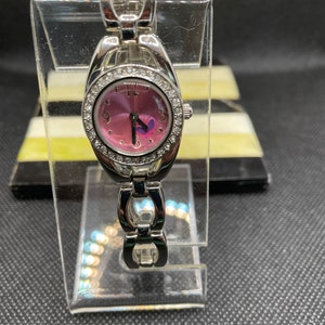 Vintage pink face butterfly ladies watch