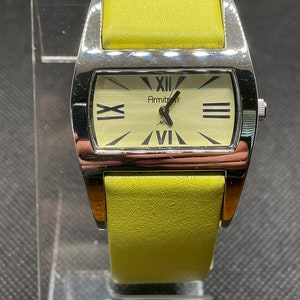 Vintage Armitron Yellow Unique ladies watch.