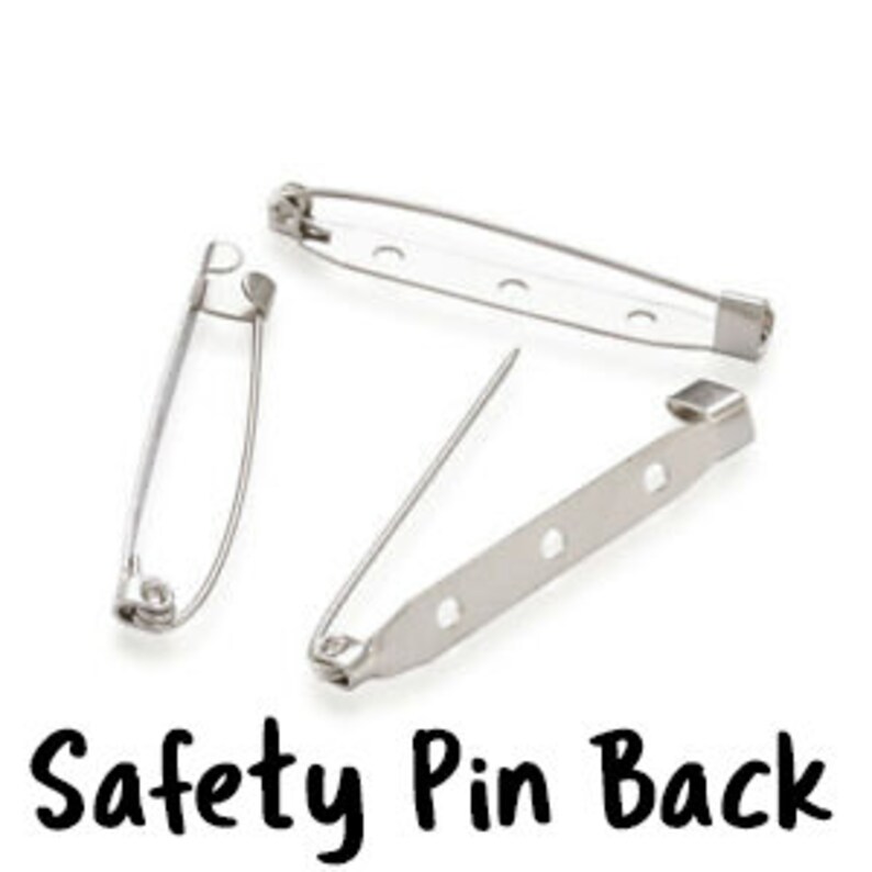 May include: Three silver safety pin backs for attaching jewelry or crafts. The pins are about 1 inch long and have a pointed end and a safety clasp.