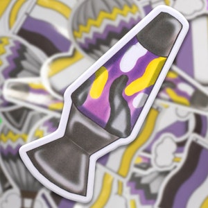 May include: A purple and yellow lava lamp sticker with a black base. The sticker is on a white background.