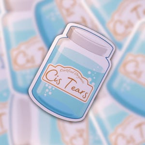 May include: A sticker of a blue glass jar with a white lid and a label that reads "Certified Organic Cis Tears".