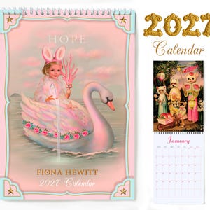 May include: A 2027 wall calendar by Fiona Hewitt featuring a spiral-bound cover with a child in bunny ears riding a swan on water, labeled HOPE. The calendar includes a January page with an illustration of anthropomorphic animals in a garden.