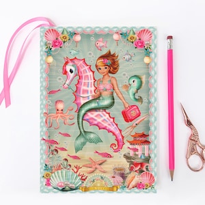 May include: A pink and blue mermaid riding a pink and white seahorse with a suitcase and a pagoda in the background. The image has a blue and green background with a white lace border. The text "Bon Voyage" is at the bottom of the image.