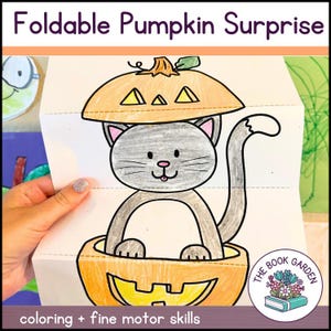 May include: A foldable paper craft featuring a gray cat inside an orange pumpkin. The pumpkin has a jack-o'-lantern face. The text "Foldable Pumpkin Surprise" is at the top. The bottom text reads "coloring + fine motor skills".