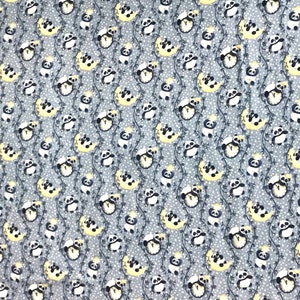 May include: A grey fabric with a repeating pattern of black and white pandas holding onto yellow crescent moons. The pandas are surrounded by small white dots and black vines.