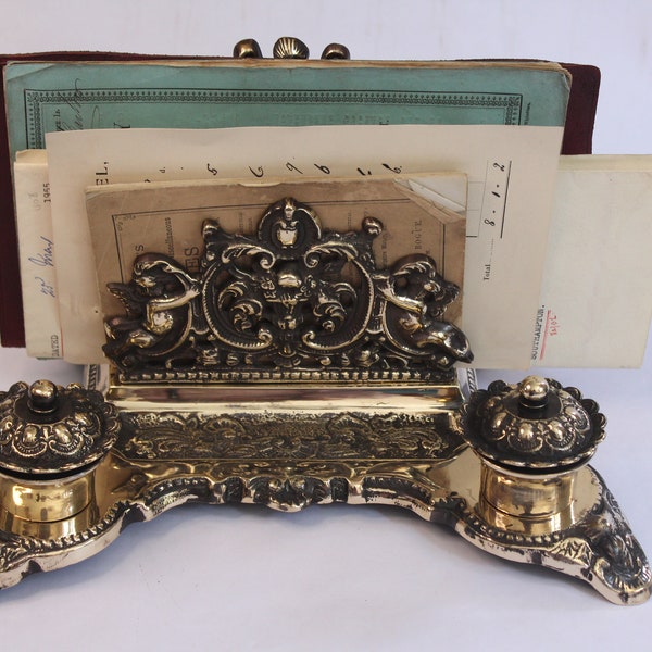 Large brass Victorian style inkwell including old documents.