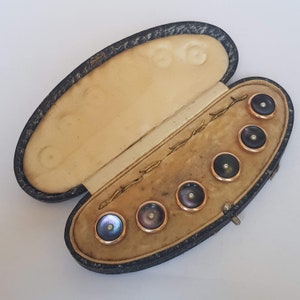Antique black mother of pearl and seed pearl dress set.