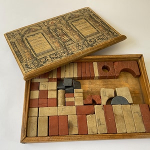 Antikes Spielzeug. Richters Ankerkasten Bausteine, Architekturbaukasten, 19.Jh.
