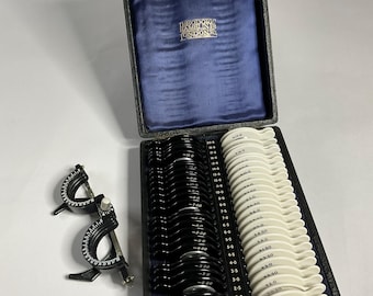 Vintage Theodore Hamblin optician’s trial lens set with frame.