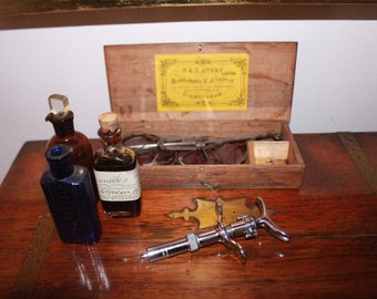 Vintage surgical equipment, dental syringe, vintage medical equipment.