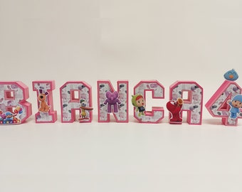 May include: Pink 3D letters spelling "BRANCA" with a pink number 4. Each letter and number features a different character from the cartoon show "Pocoyo".